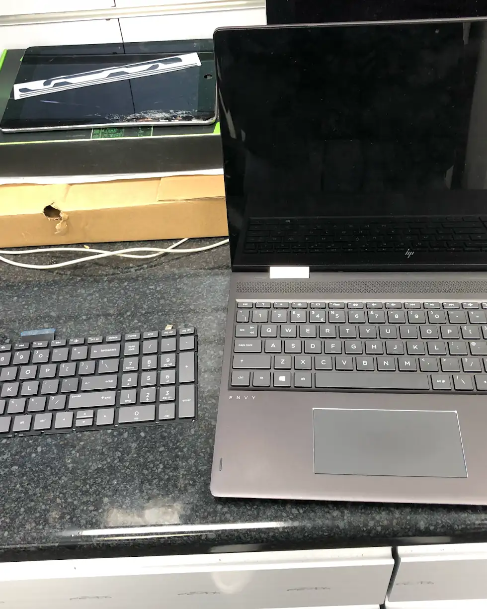HP Envy keyboard replacement in progress, one of many hands-on repairs we do daily